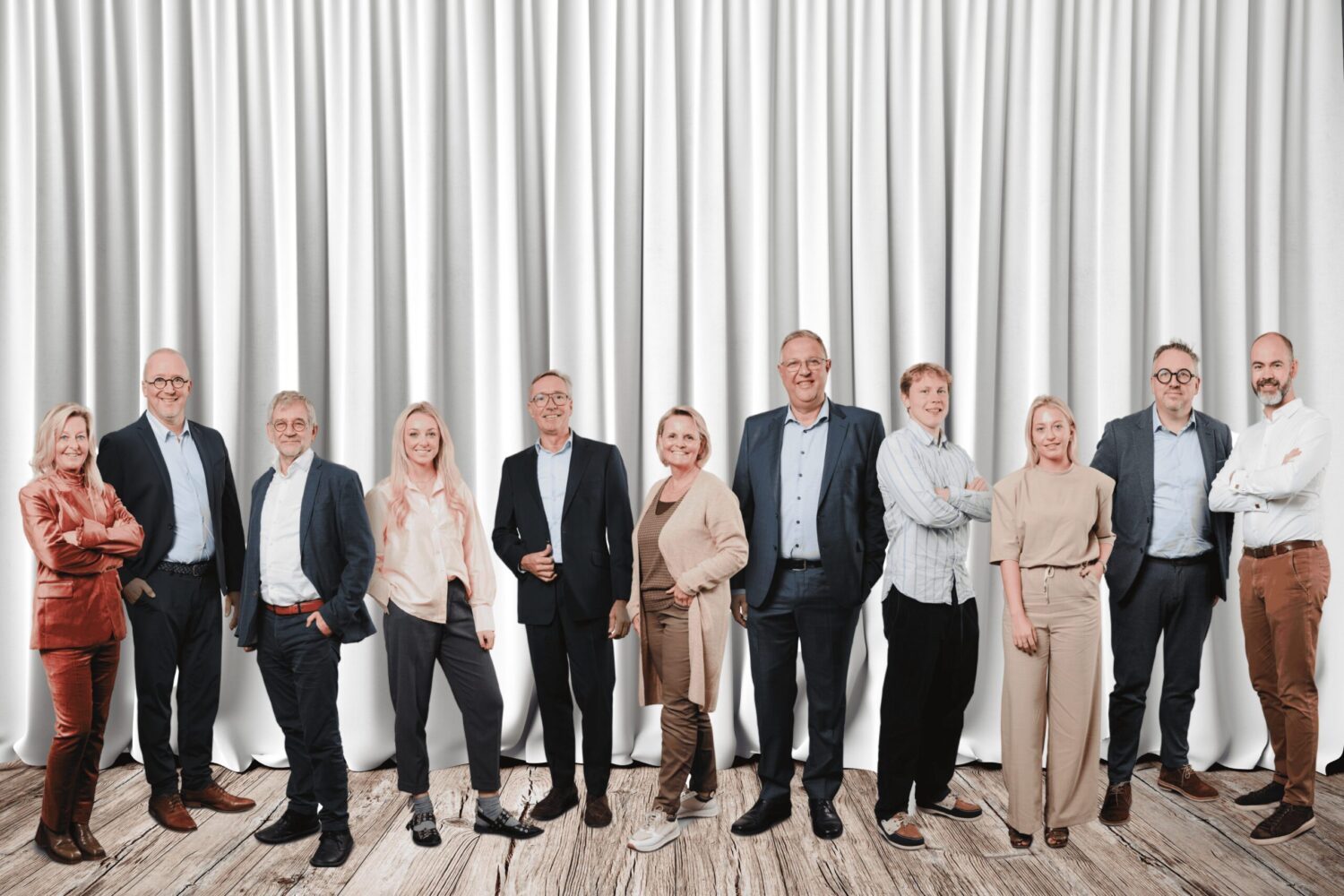 Het PLUSASSUR-team samen op de foto
